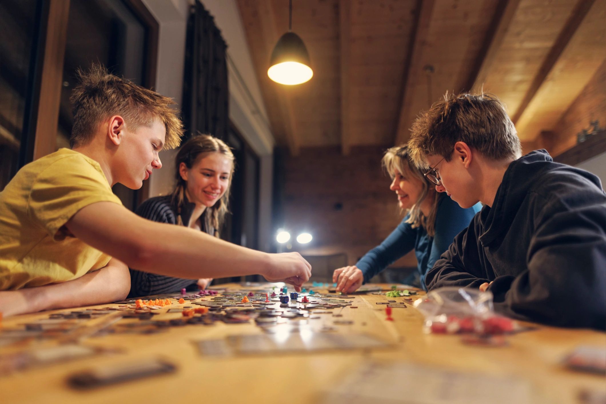 homeschool family playing board game