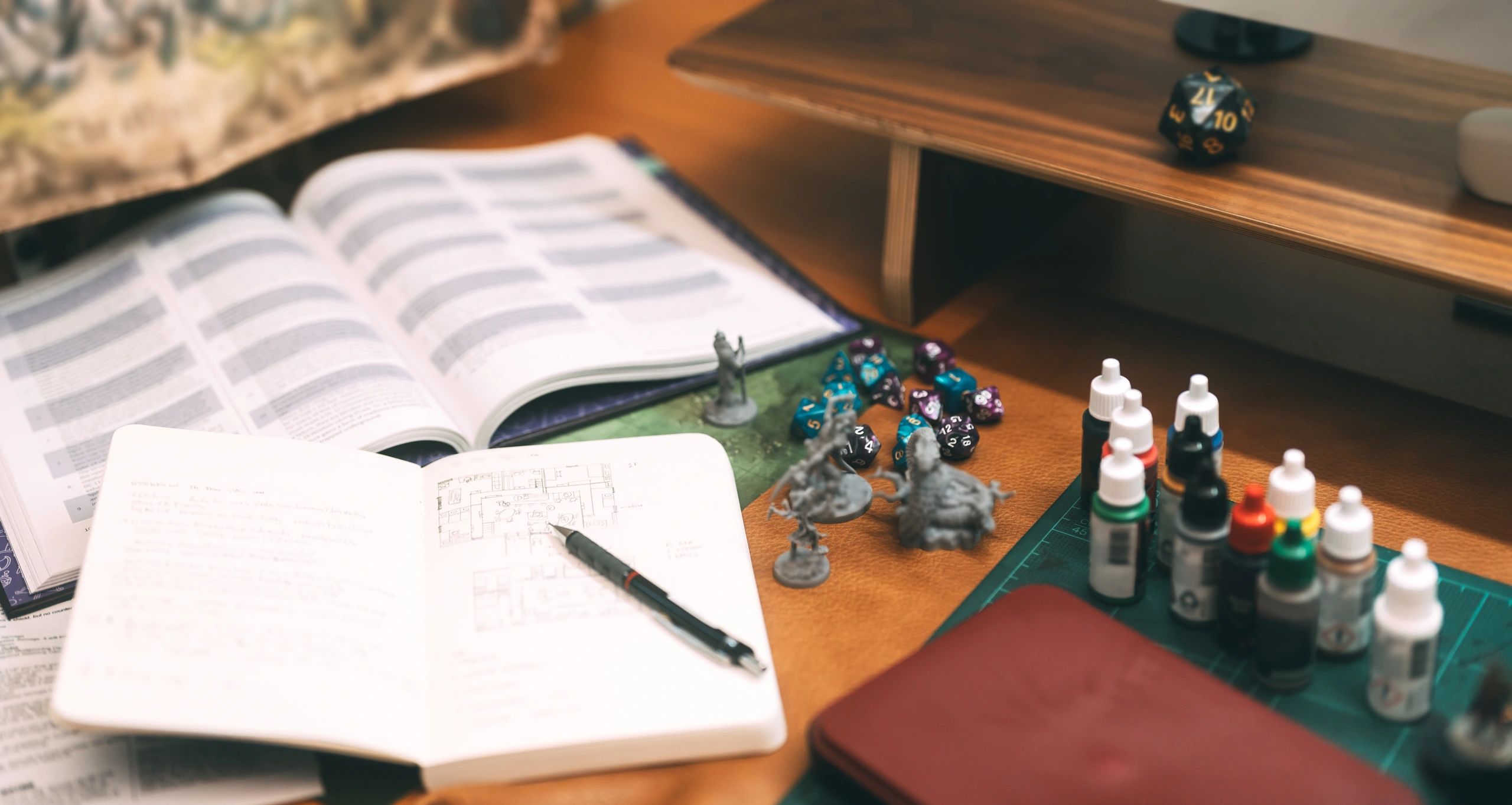 tabletop dice books hands in action