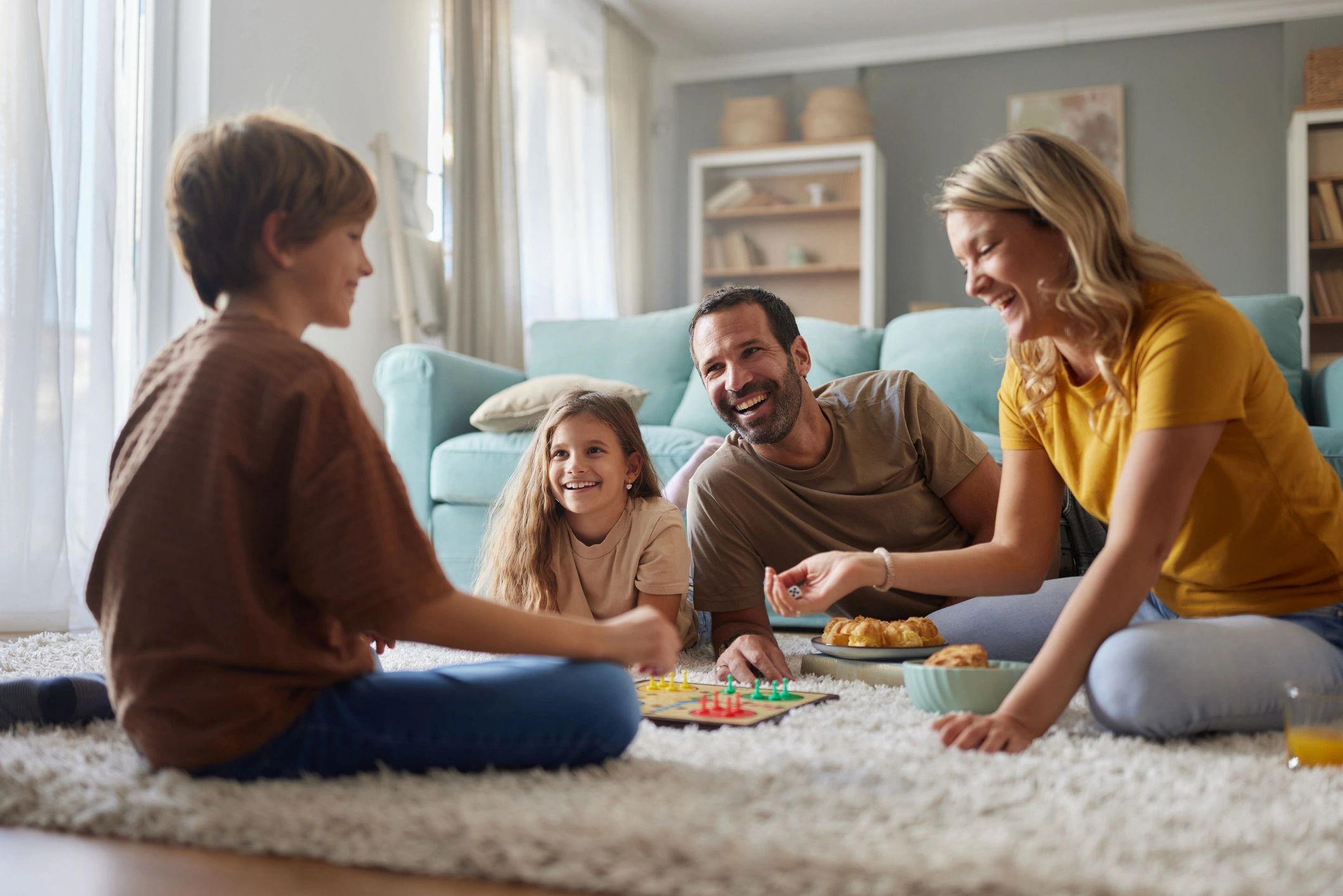 homeschool family playing board game